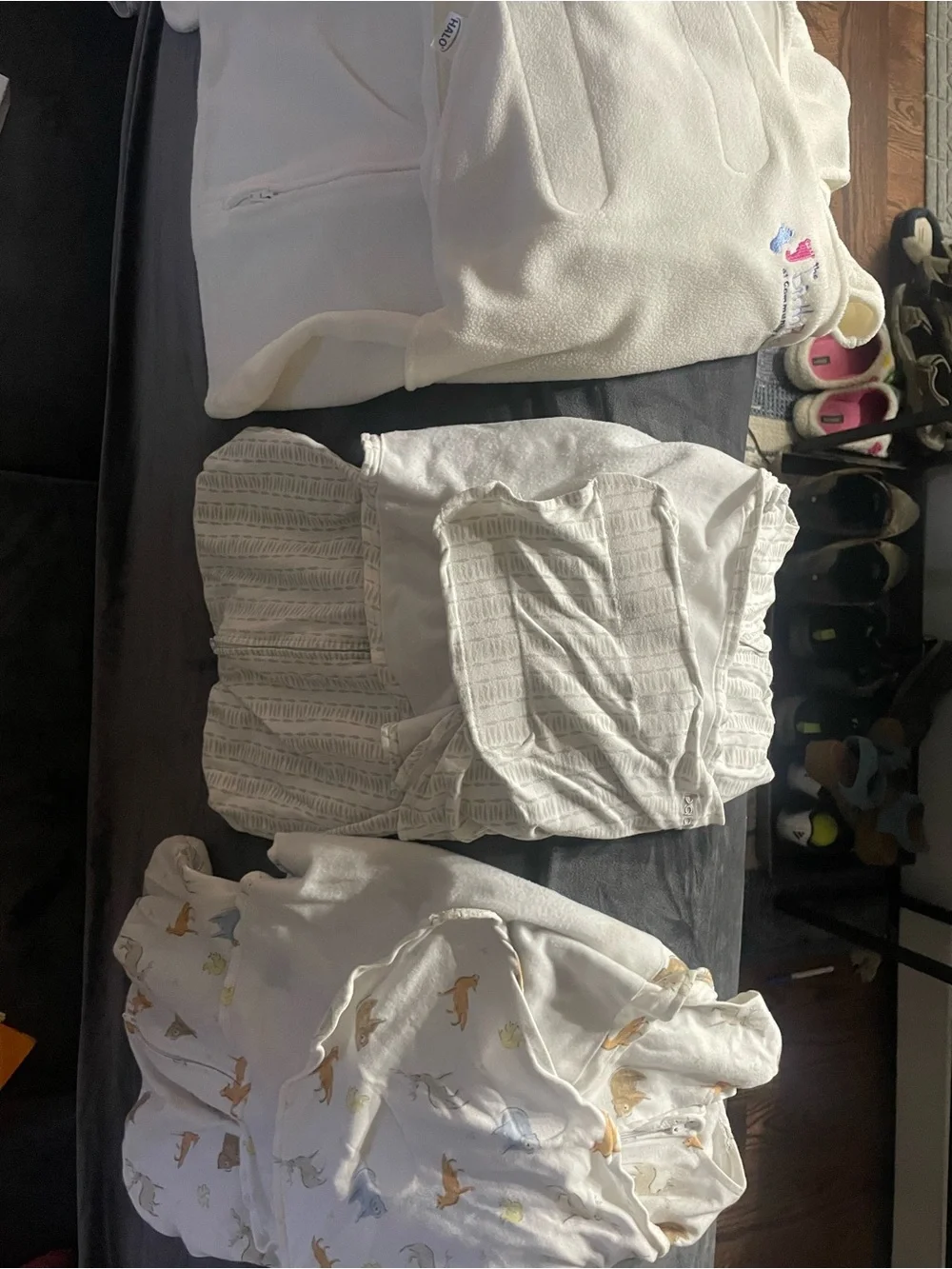 3 halo sleep sack swaddles. Neutral. Striped, animals, and 1fleece.